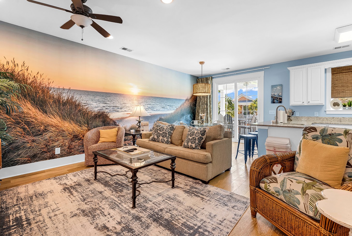 Living room with stunning sunset beach mural