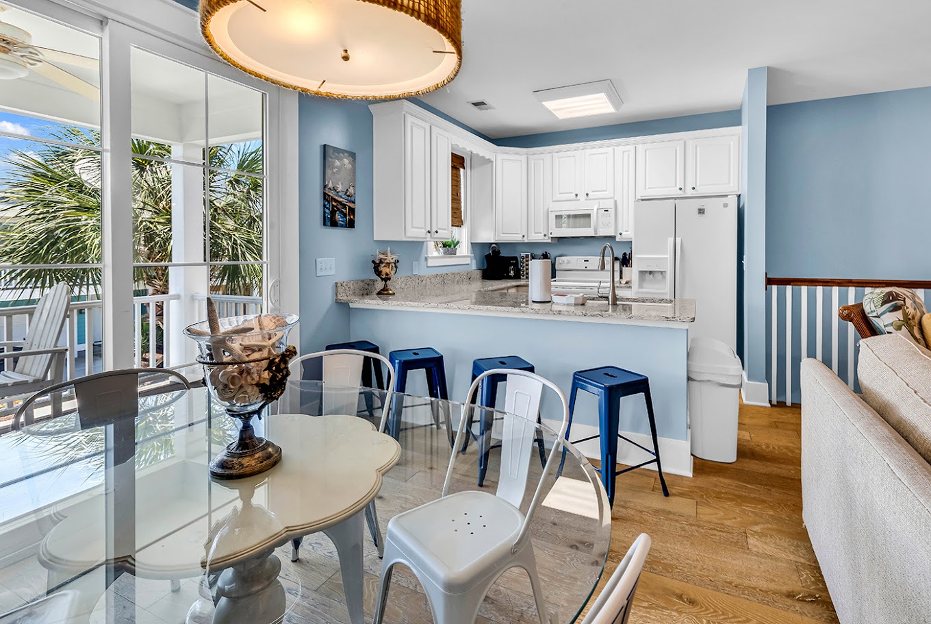 Kitchen and dining with balcony view